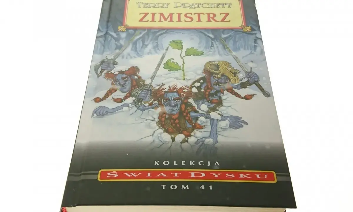 Okładka książki "Zimistrz" z serii "Świat Dysku" Tom 41. Trzy niebieskoskóre, brodate postaci z mieczami wychodzą ze śniegu.