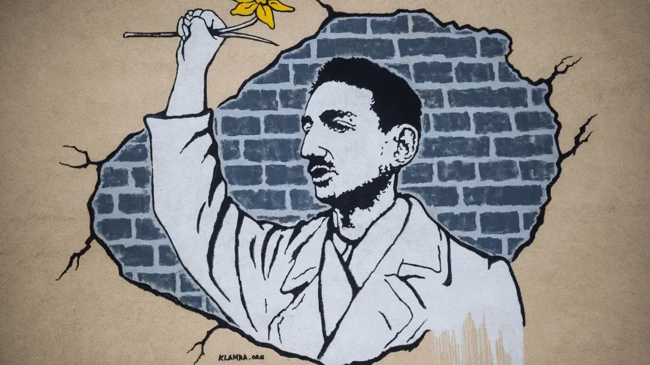 Mural przedstawia mężczyznę z żółtym kwiatem, który przebija się przez ceglaną ścianę. Jakby chciał zdążyć przed panem bogiem, by wręczyć mu ten symbol nadziei.
