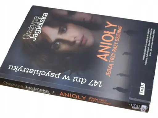 Okładka książki Grażyny Jagielskiej "Anioły jedzą trzy razy dziennie", opowiadającej o 147 dniach w psychiatryku.